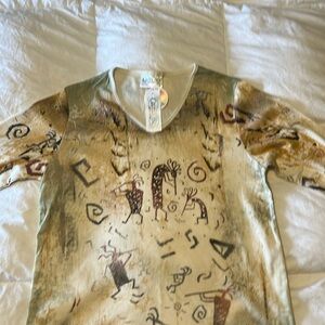 V neck 3/4 length sleeve woman top.